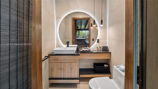 bathroom with vanity and toilet