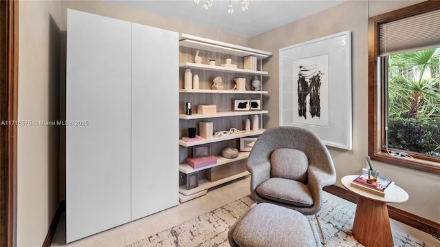 sitting room with light tile patterned floors