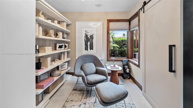 sitting room with a barn door