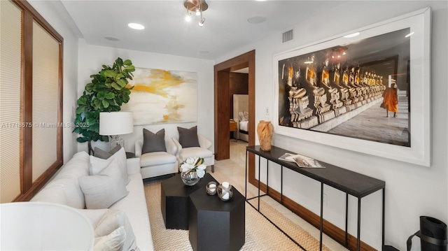 living room with light tile patterned floors