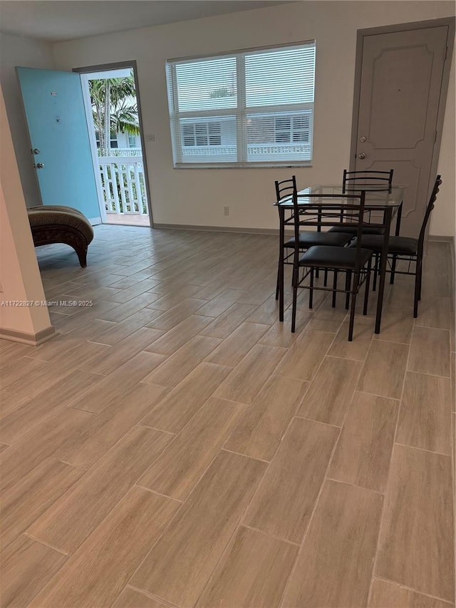 dining area with light hardwood / wood-style floors