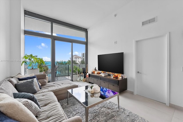 living room with a wall of windows