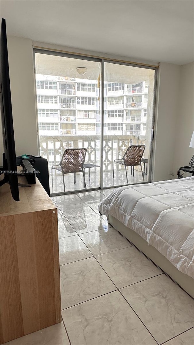 bedroom with a wall of windows