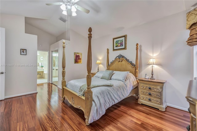 bedroom with hardwood / wood-style flooring, ensuite bath, ceiling fan, and lofted ceiling