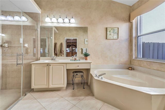 bathroom featuring vanity, tile patterned flooring, and plus walk in shower