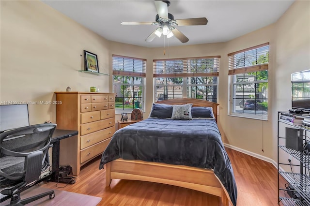 bedroom featuring ceiling fan and light wood-type flooring