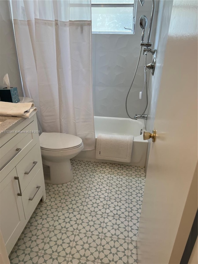 full bathroom featuring vanity, shower / tub combo, and toilet