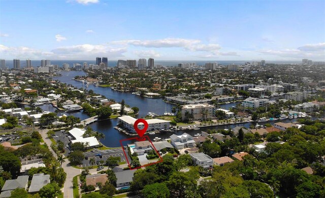 birds eye view of property featuring a water view