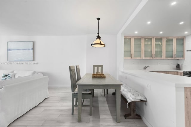 dining area featuring sink