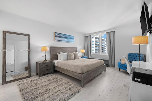 bedroom featuring light hardwood / wood-style flooring