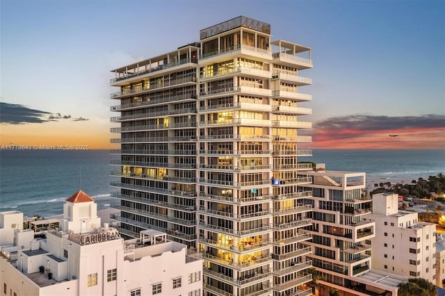 outdoor building at dusk with a water view