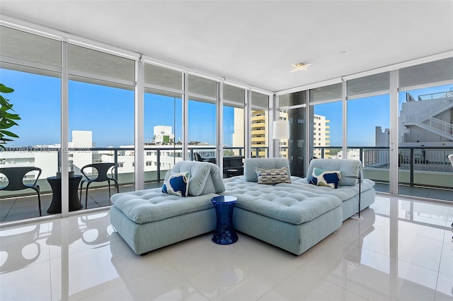 tiled living room with expansive windows