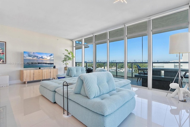 living room with tile patterned floors and expansive windows