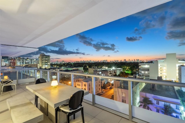 view of balcony at dusk