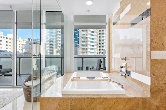 bathroom featuring tiled tub