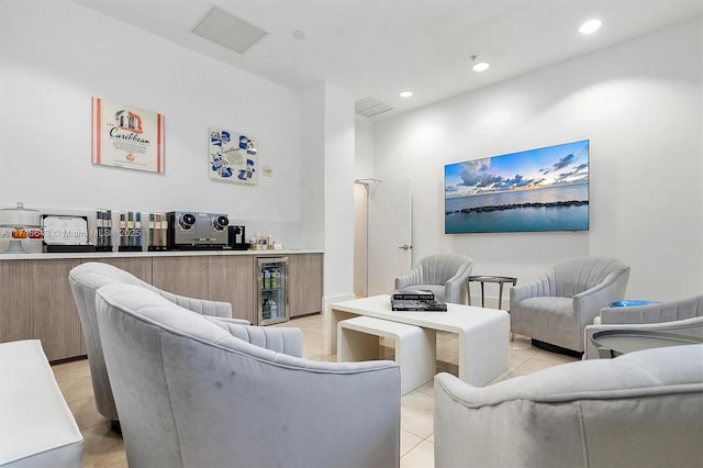 tiled living room featuring beverage cooler