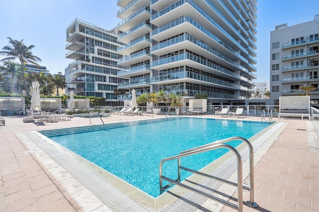 view of swimming pool featuring a patio