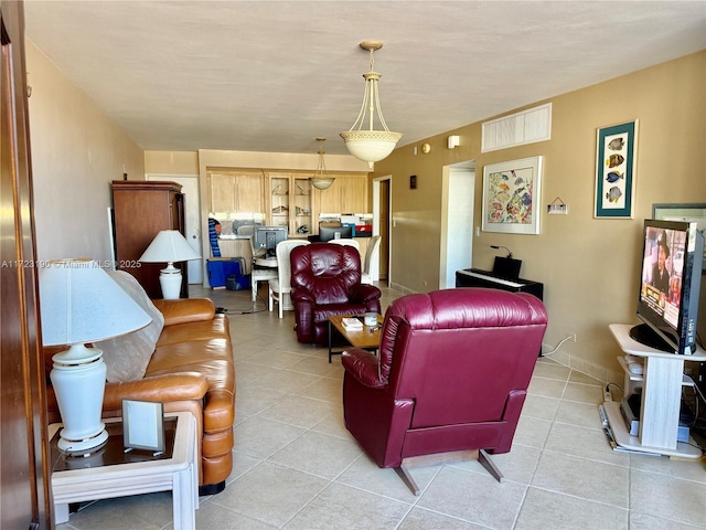 living room featuring light tile patterned floors