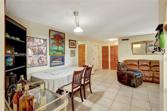 8860 SW 123rd Ct Unit K207, Miami, FL 33186 - dining space featuring visible vents and light tile patterned floors