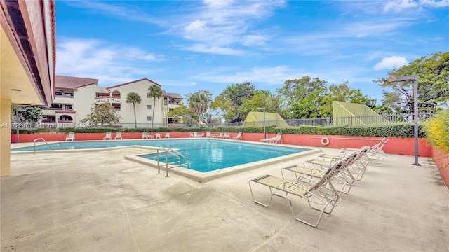 8860 SW 123rd Ct Unit K207, Miami, FL 33186 - community pool featuring a patio and fence