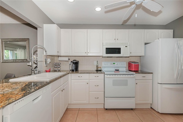 kitchen featuring ceiling fan, sink, white appliances, decorative backsplash, and white cabinets