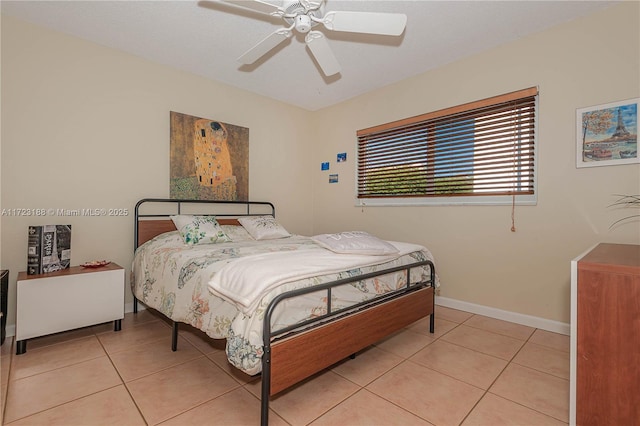 400 NE 14th Ave Unit 214, Hallandale Beach, FL 33009 - bedroom featuring light tile patterned flooring, ceiling fan, and baseboards