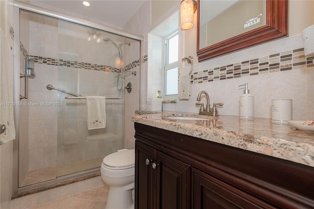 400 NE 14th Ave Unit 214, Hallandale Beach, FL 33009 - bathroom with toilet, tile patterned floors, a shower stall, and vanity