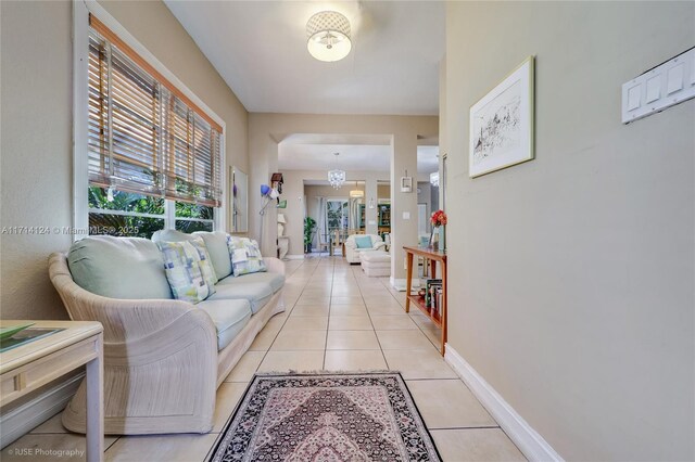 living room with light tile patterned flooring