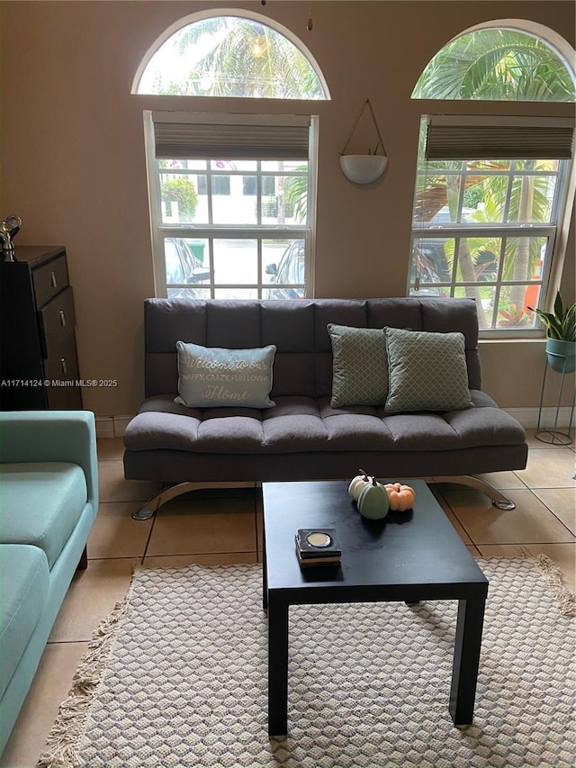 living room with light tile patterned floors