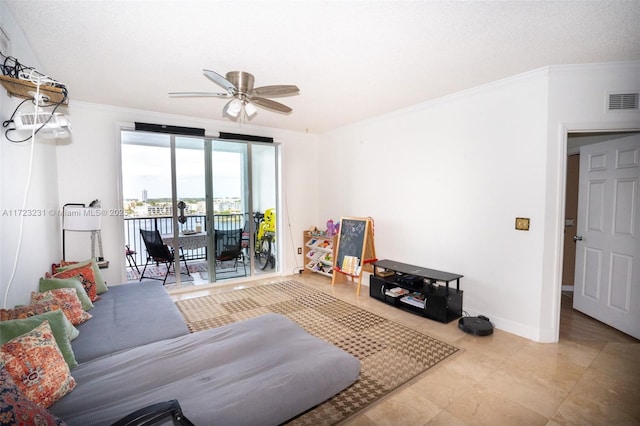 living room featuring crown molding and ceiling fan