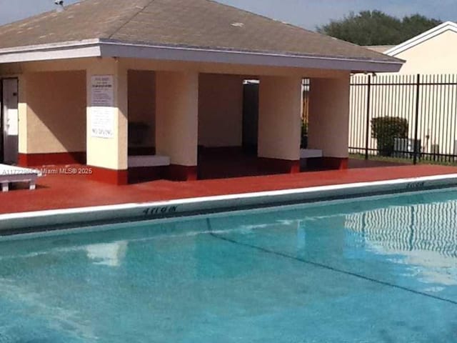 21340 NE 8th Ct Unit 1, Miami, FL 33179 - community pool featuring fence