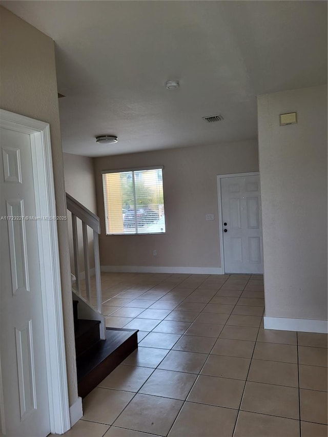 interior space with light tile patterned flooring