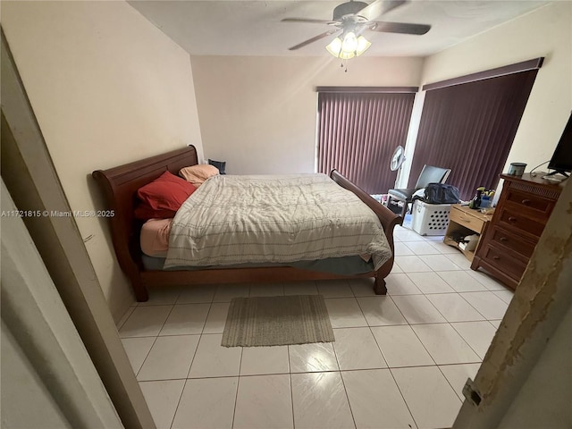 bedroom featuring ceiling fan and light tile patterned flooring