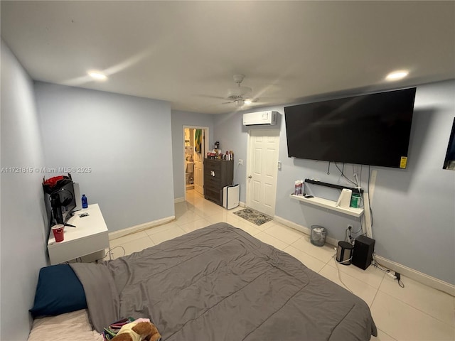 bedroom with ceiling fan, light tile patterned floors, and a wall mounted air conditioner