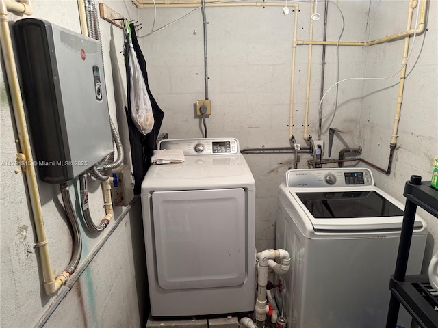 laundry room with separate washer and dryer