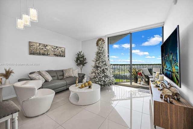 tiled living room featuring expansive windows