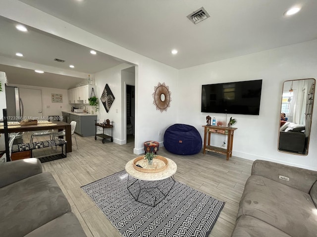 living room with sink