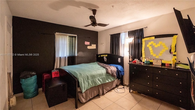 tiled bedroom with ceiling fan