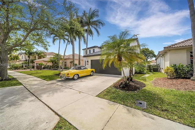 mediterranean / spanish-style home with a garage and a front yard