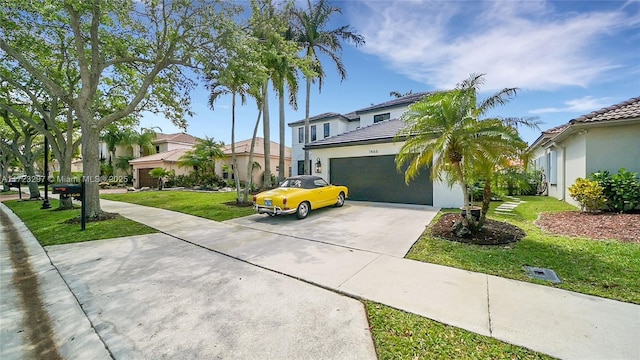 mediterranean / spanish house featuring a front lawn