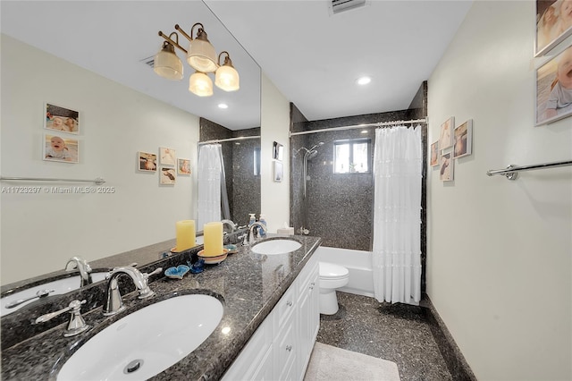 full bathroom with toilet, vanity, and shower / bath combo with shower curtain