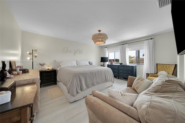 bedroom with light wood-type flooring