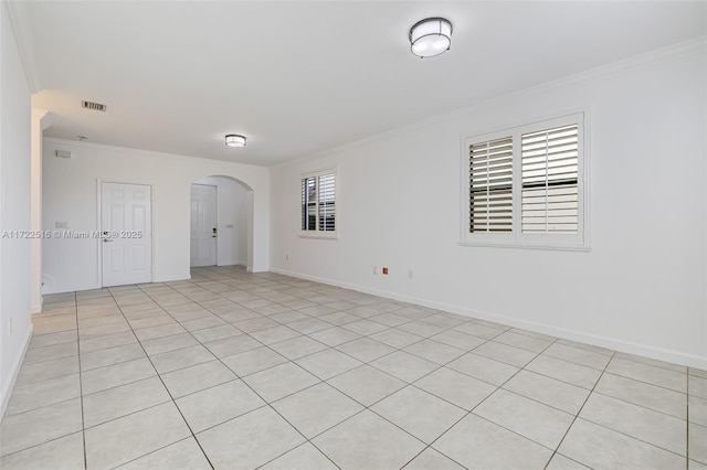 tiled empty room with ornamental molding