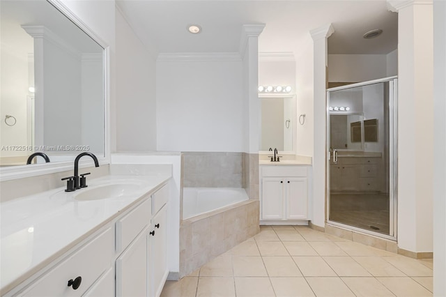 bathroom featuring independent shower and bath, vanity, tile patterned floors, and ornamental molding