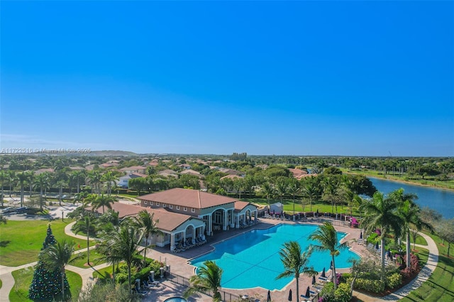 view of pool with a water view