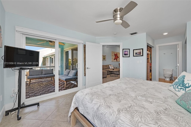 tiled bedroom featuring ceiling fan, access to exterior, and ensuite bath