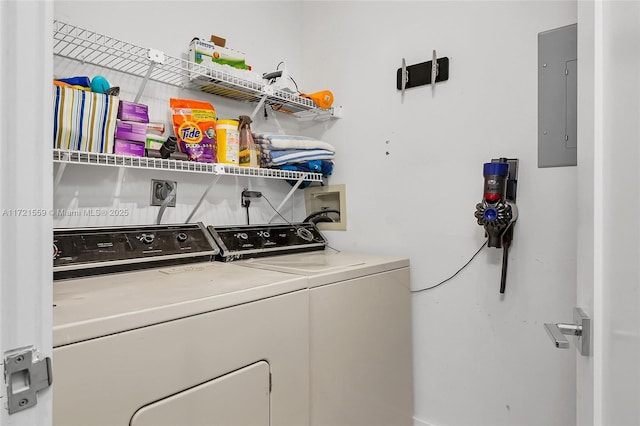 laundry area featuring washer and dryer and electric panel