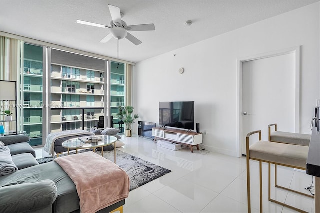 79 SW 12th St Unit 3809S, Miami, FL 33130 - tiled living room with floor to ceiling windows, a ceiling fan, and a textured ceiling