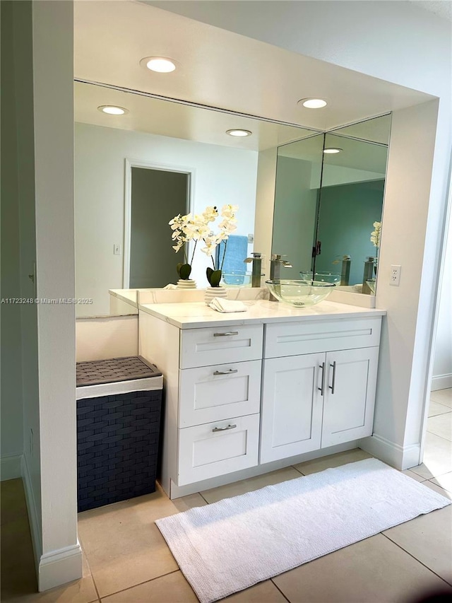 bathroom with vanity and tile patterned floors