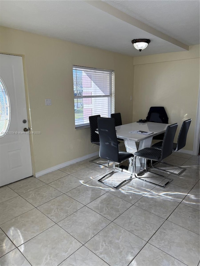 dining space with light tile patterned floors